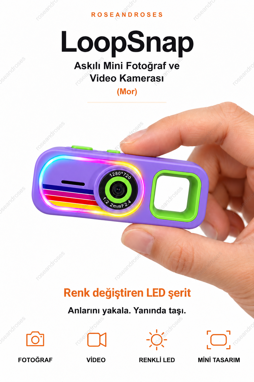 LoopSnap Mor mini kamera — parmaklar arasında tutuş ve renk değiştiren LED şerit